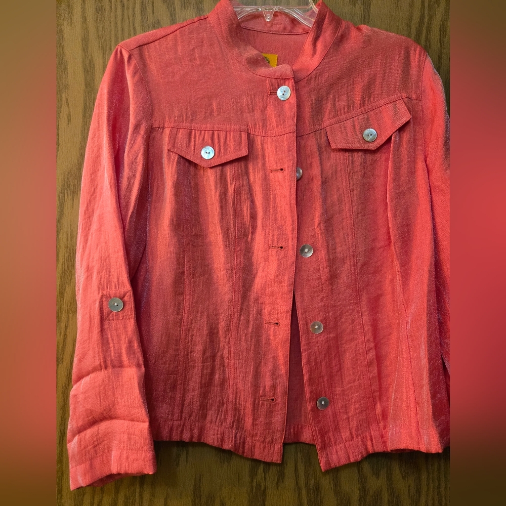Very pretty, long sleeve shiny, coral colored button up top. Size 8 petite.